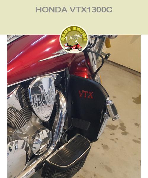 Honda VTX1300C with black engine guard chaps with VTX embroidered in red